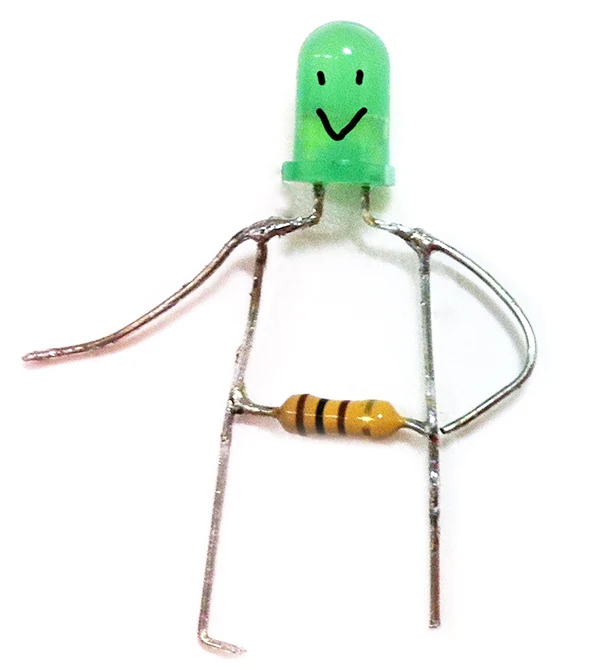 緑のLEDに笑顔を描き、電子部品でからだをつくったLEDマンの実物